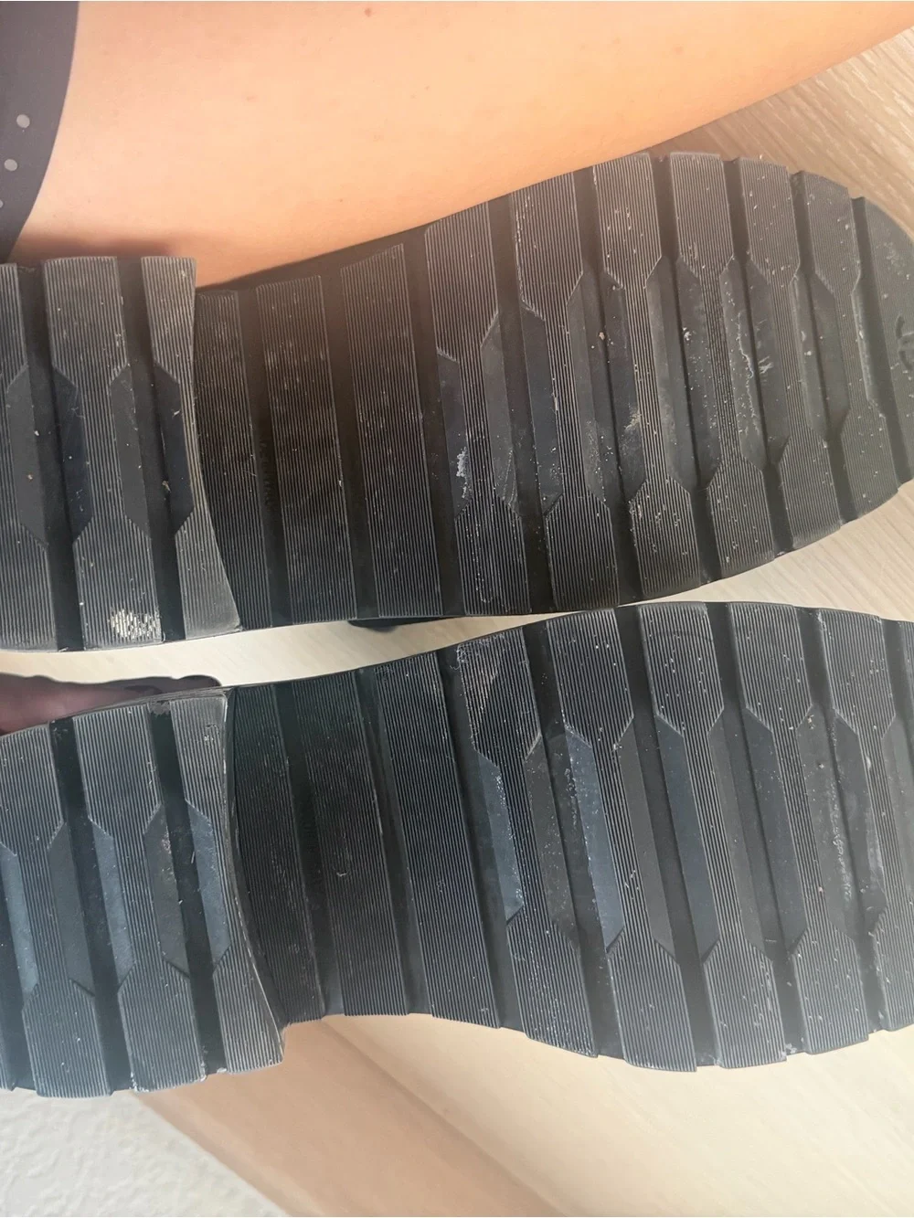 CHANEL Black Quilted Leather Combat Boots with Patent Toe